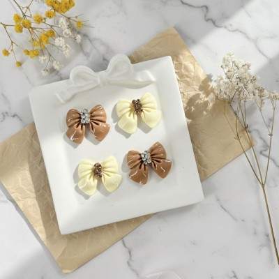 Кабошоны акриловые "Бантики в стразах" для рукоделия и декора - набор 4 шт.