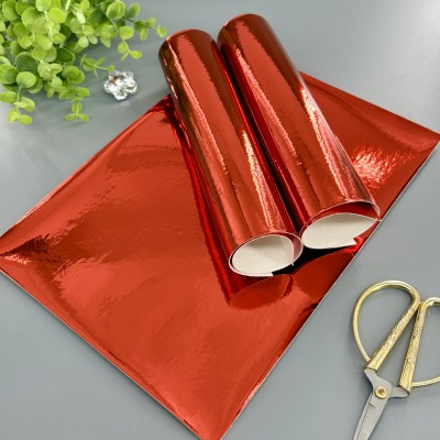 Кожзам однотонный глянцевый (зеркальный) красный Кожзам однотонный глянцевый (зеркальный) красный