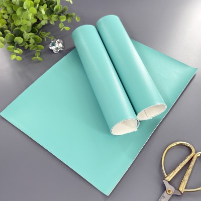 Кожзам однотонный гладкий бирюзовый Кожзам однотонный гладкий бирюзовый